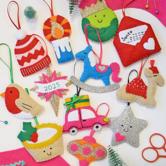 12 handmade christmas decorations made from colourful felt