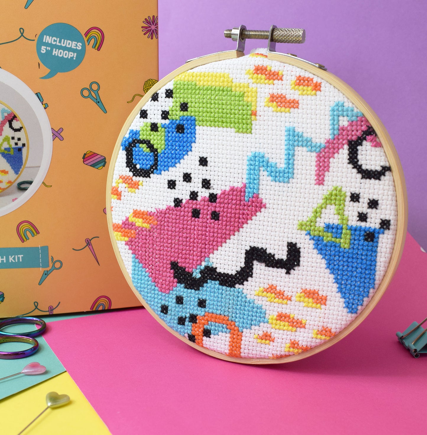 cross stitch design with abstract memphis style pattern