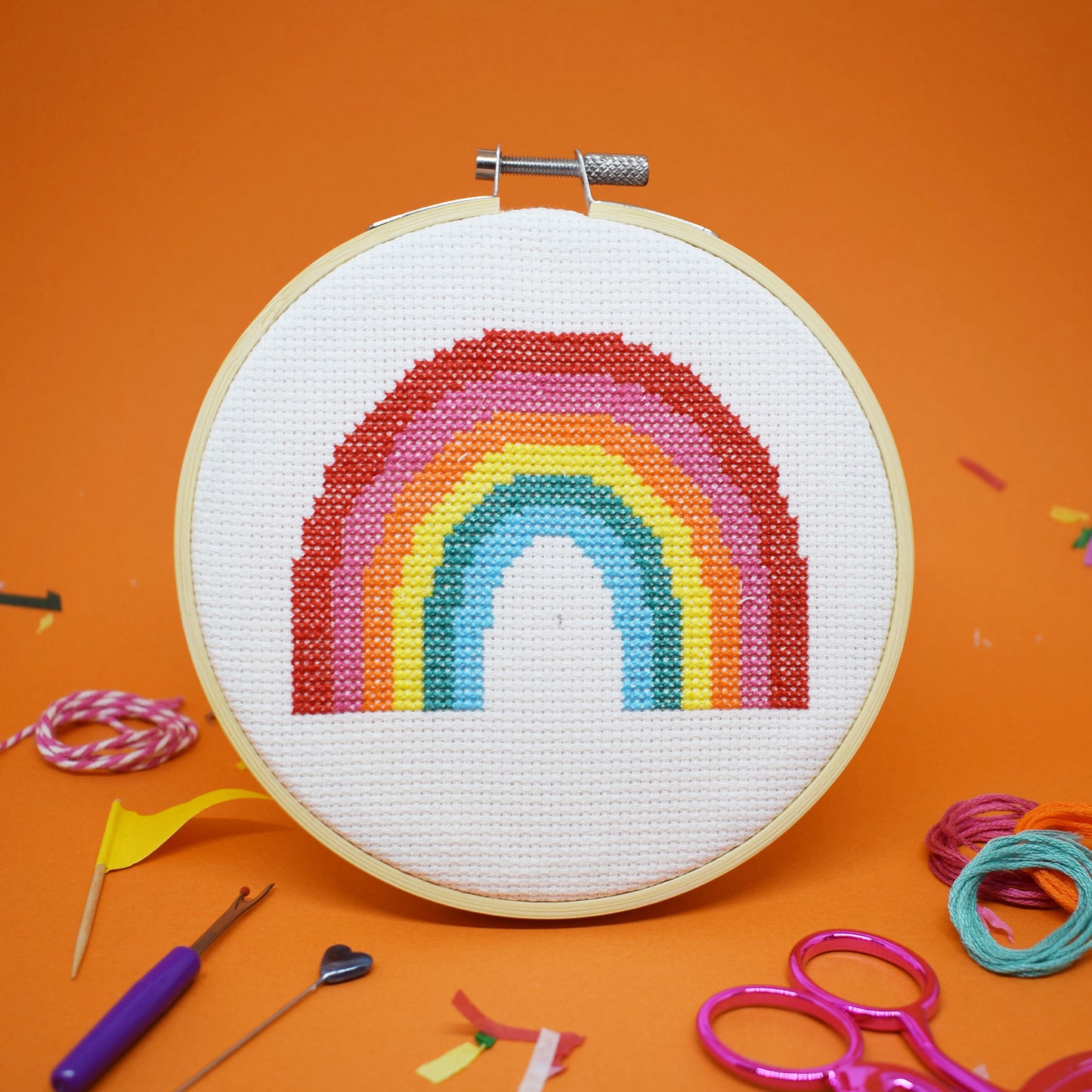 cross stitch design with large rainbow design