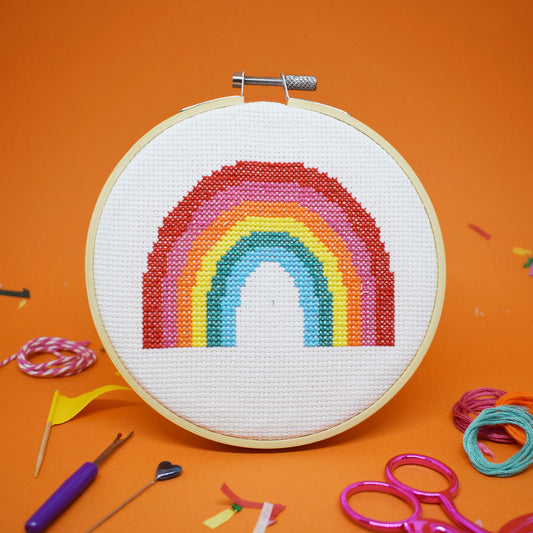 cross stitch design with large rainbow design