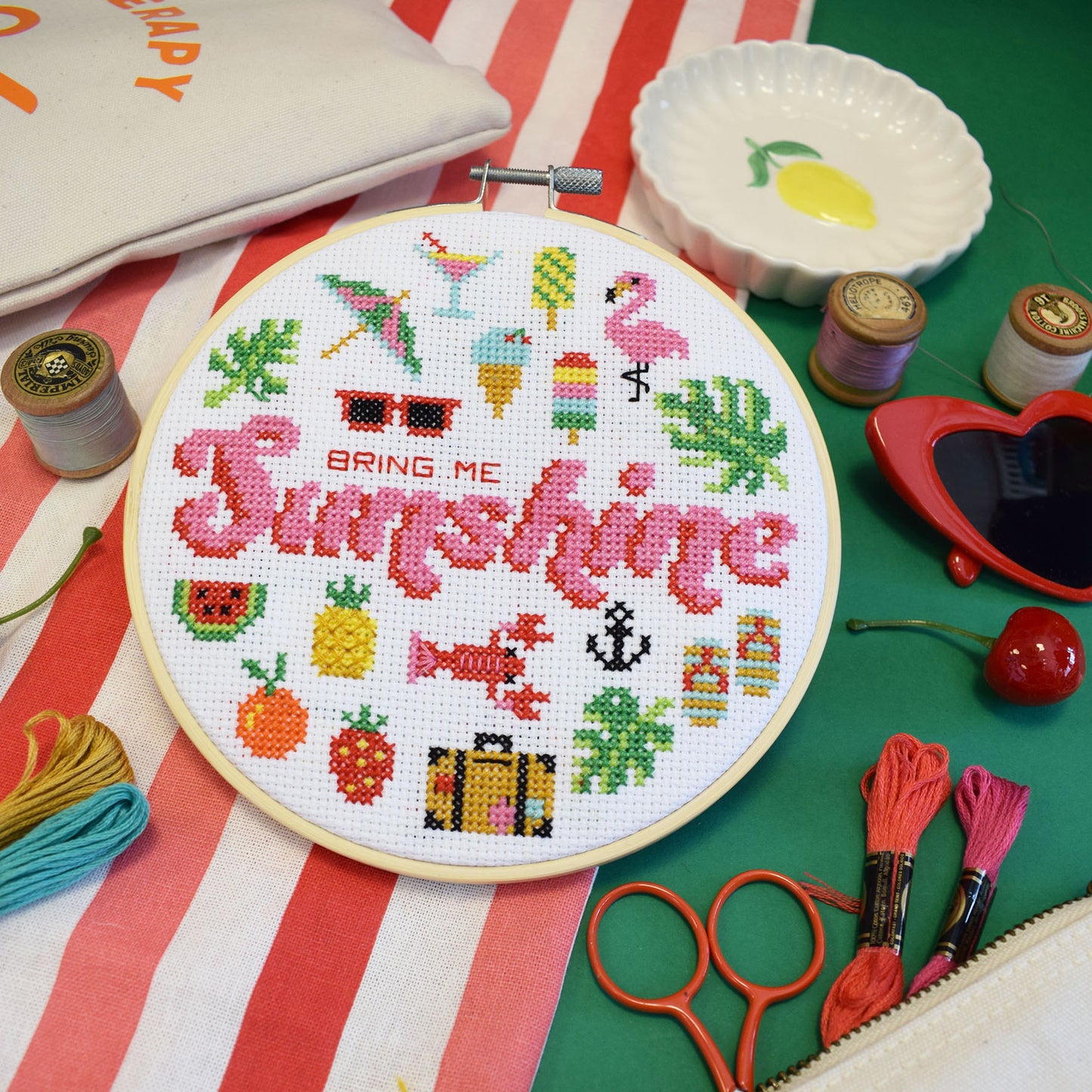 6" cross stitch kit with a 'bring me sunshine' motto and summer themed motifs.