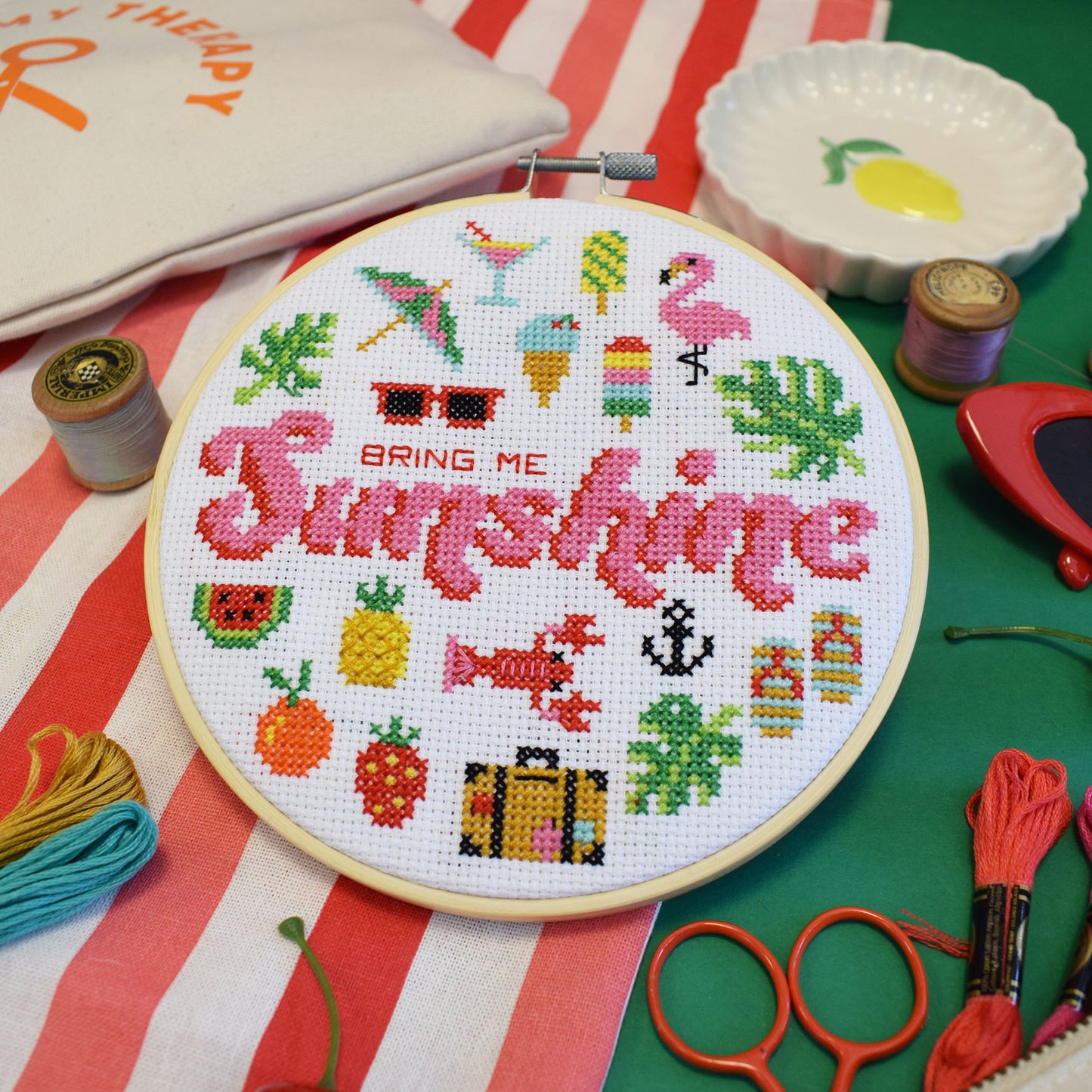 Bring Me Sunshine cross stitch kit with 6-inch hoop, colourful threads, Aida fabric, and instruction sheet on white background