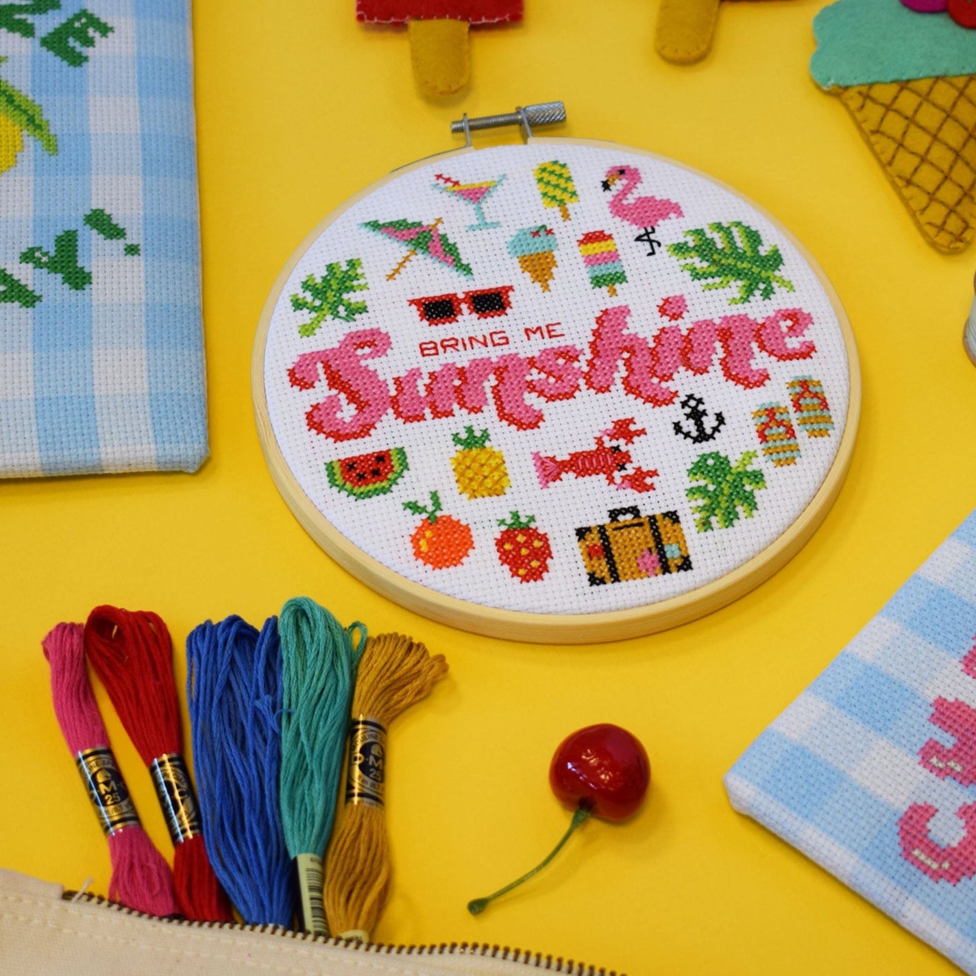the Bring Me Sunshine cross stitch kit, with colourful cross stitch design and colours with a summer theme