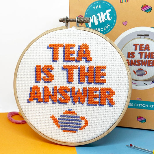 cross stitch design with tea is the answer slogan and teapot motif