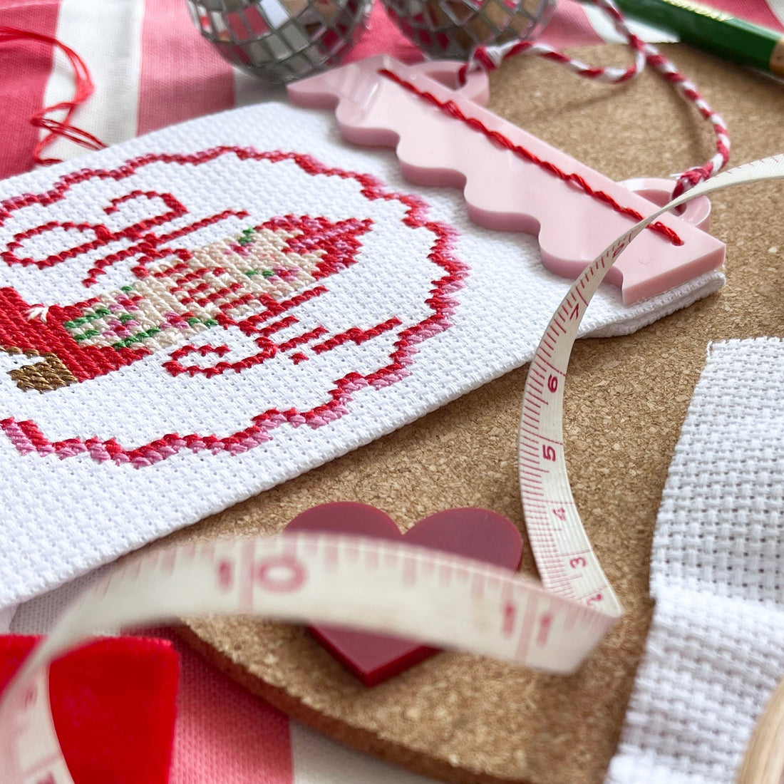 image of a cross stitch project with 'howdy' and a cowboy boot on it